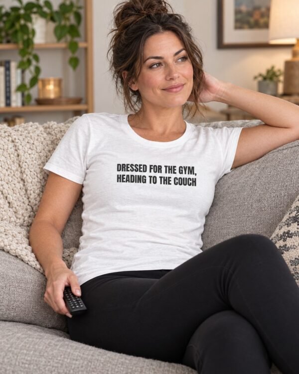 Woman wearing the Dressed For The Gym, Heading To The Couch women's tee